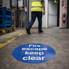 Fire Escape Floor Graphic Sign – 400mm Diameter – Polycarbonate – Industrial