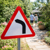 Left Bend Ahead Reflective Traffic Sign – 600mm Triangle – 3mm Aluminium Composite – Outdoor Use (Class RA1)
