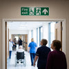 Fire Exit Sign – Disabled Symbol & Arrow Down – Safety Signage – Indoor/Outdoor