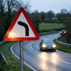 Left Bend Ahead Reflective Traffic Sign – 600mm Triangle – 3mm Aluminium Composite – Outdoor Use (Class RA1)