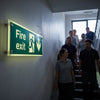 Photoluminescent Fire Exit Down Sign – 450mm x 150mm – Clear Acrylic – Indoor/Outdoor